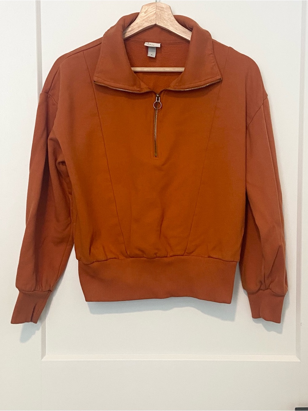 Orange Sweater with Gold Zipper